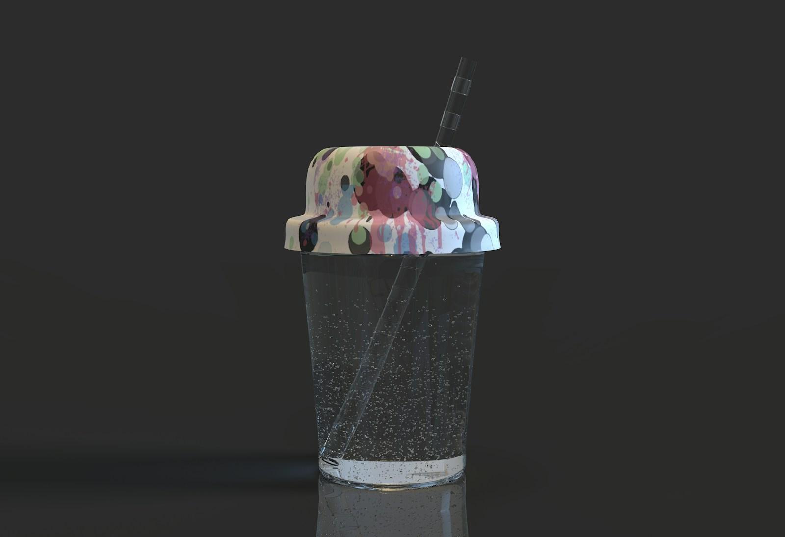 a plastic cup with a straw inside of it